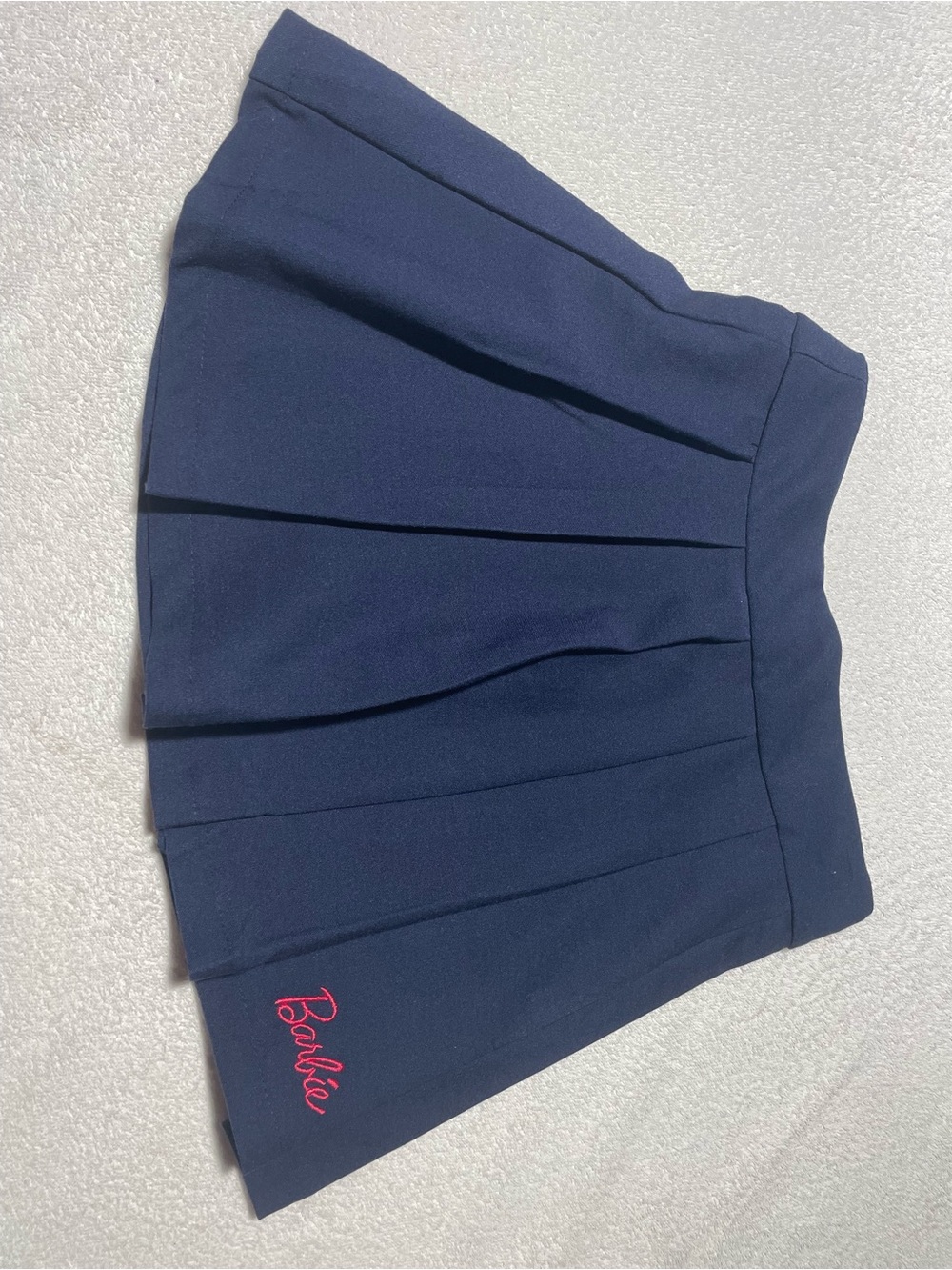 Barbie Navy Pleated Skirt with Pink Script Logo